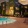 pool with lounge chairs at dusk